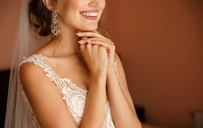 Bride smiling in a wedding dress