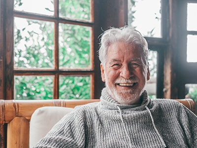 Closeup of senior man smiling at home